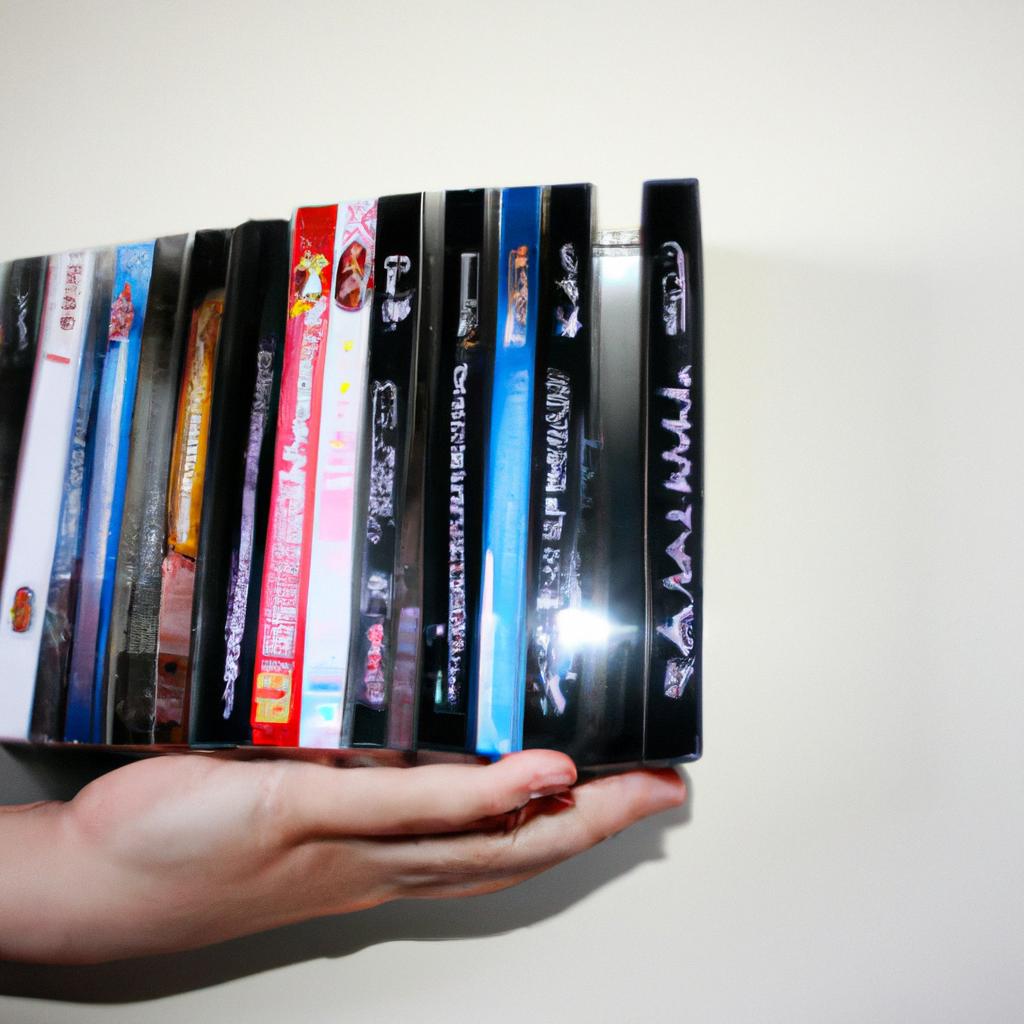 Person holding DVD box sets